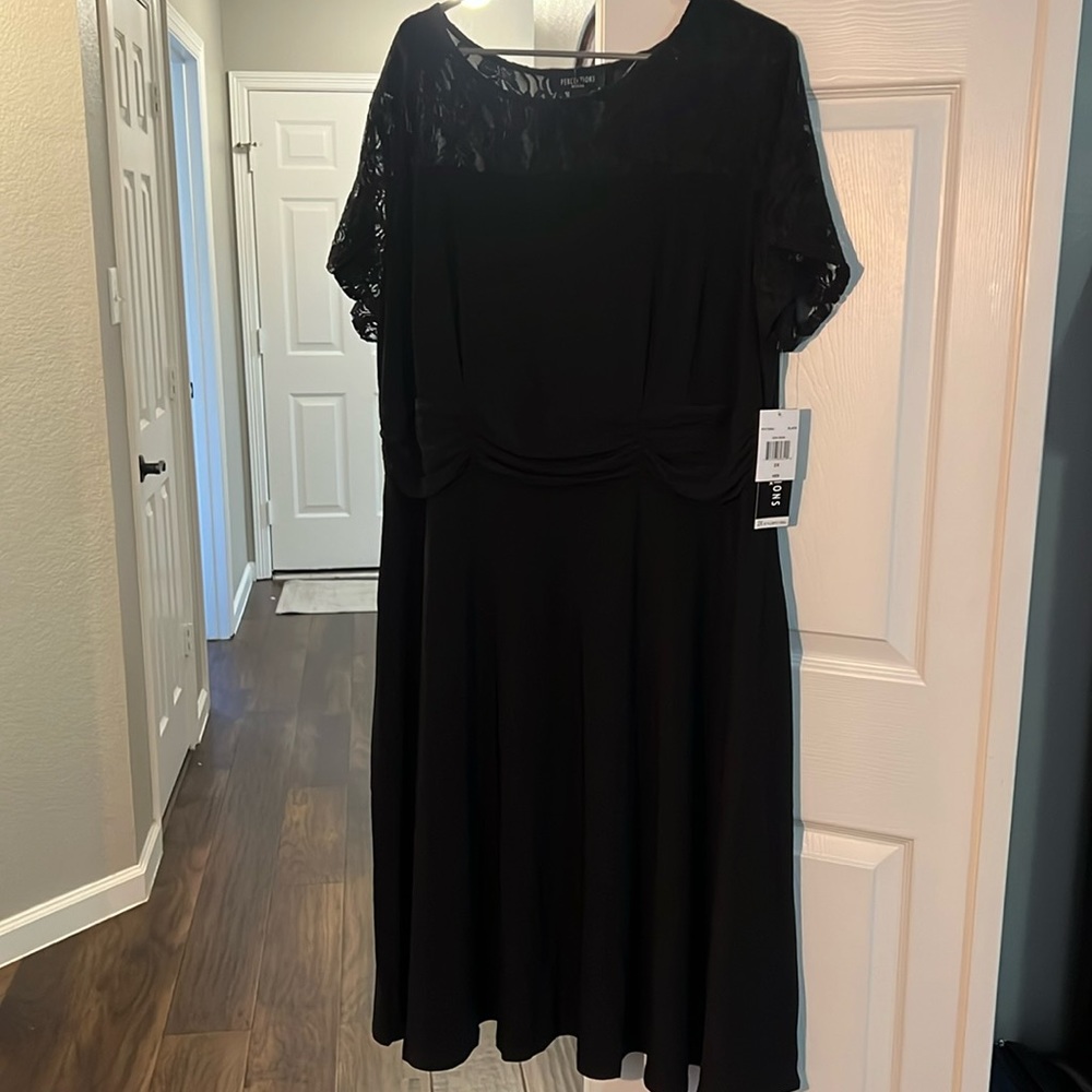 Black party dress, size 2X, flattering fit, comfortable, NWT,